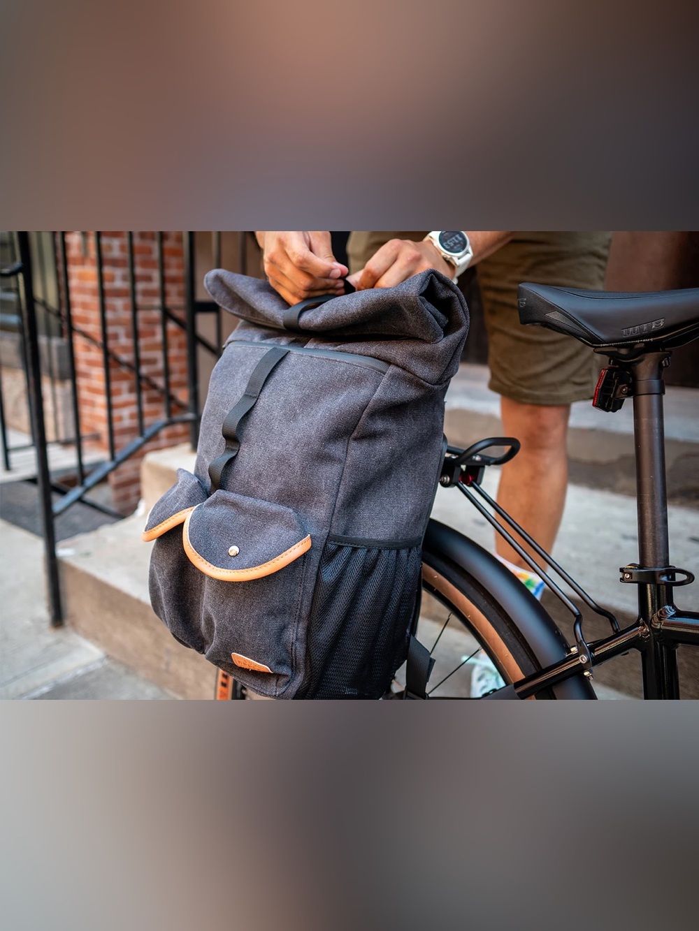 Classic Gray Roll-Top Backpack with Tan Trim